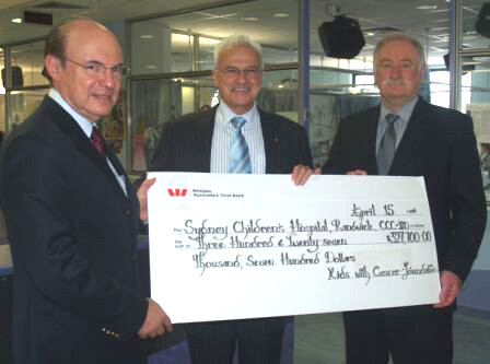 Senior Oncologist Dr. Richard Cohn, Head of Clinical Oncology , Professor Les White AM, Executive Director Sydney Children's Hospital receiving the cheque for $327,700 from the Kids with Cancer Foundation's Peter Bodman.